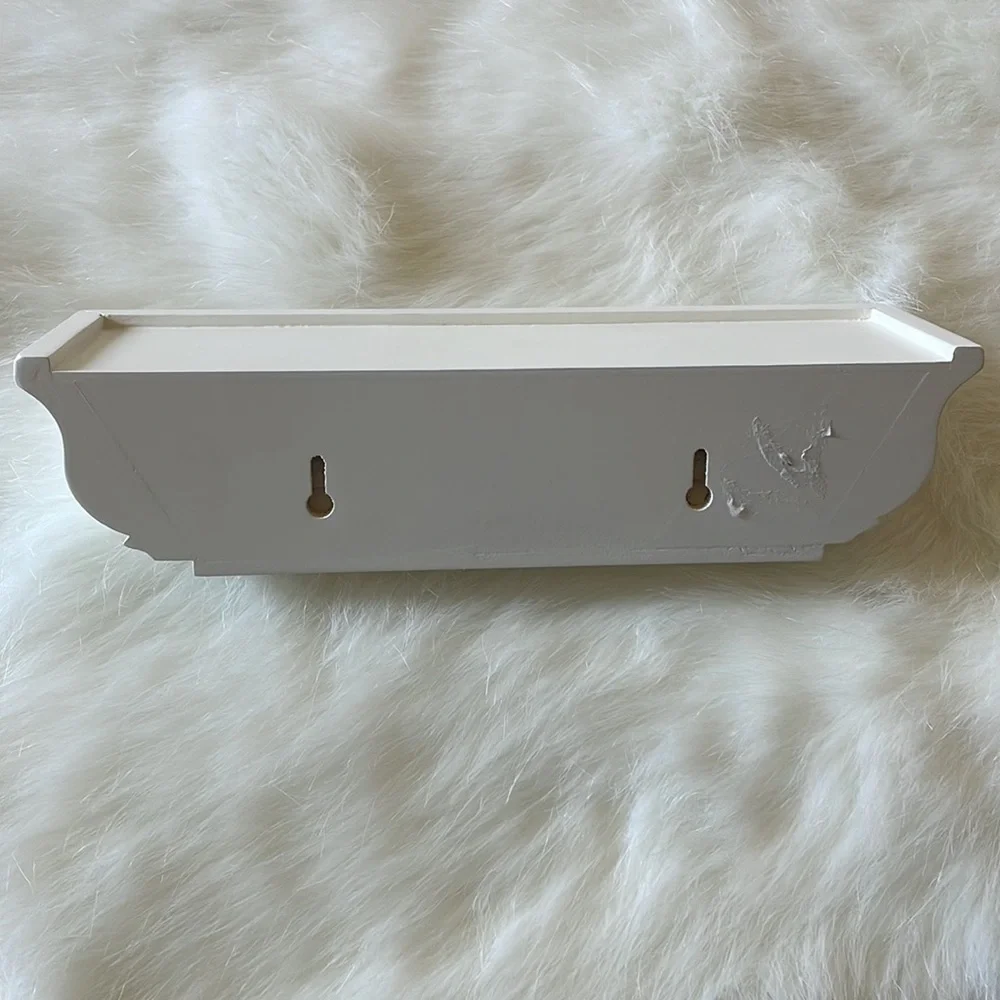 small white shelf